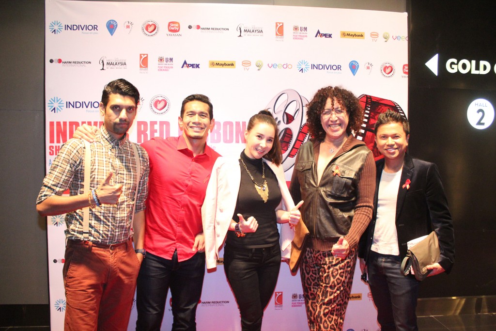 Red Ribbon Celebrity Supporters of the Malaysian AIDS Council and Malaysian AIDS Foundation at the Indivior International Harm Reduction Film Festival premiere gala, celebrating winners of the Indivior Red Ribbon Short Film Competition. From left: Aanantha, Fahrin Ahmad, Winnie K, Dee and Shah Shamshiri. © Malaysian AIDS Council/Malaysian AIDS Foundation